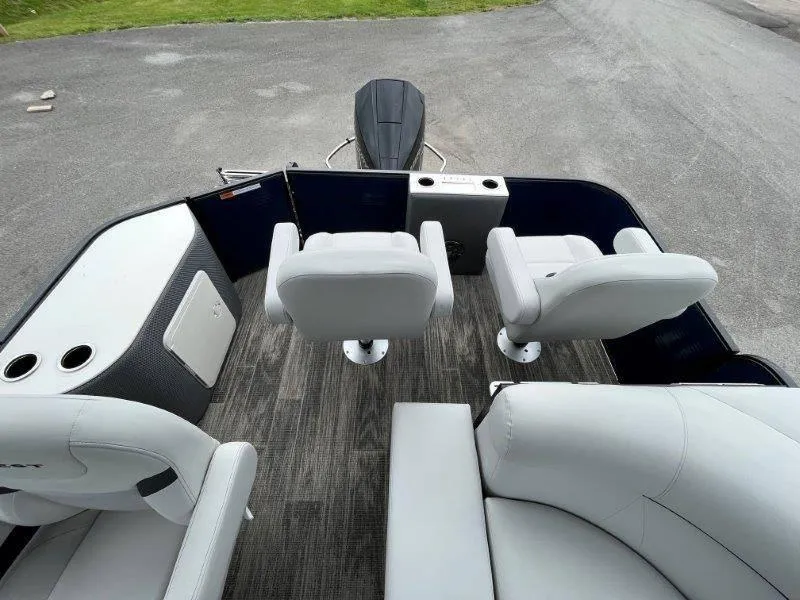 Slide: The Image of 2023 Crest Classic Fish 220 SF boat interior with plush seating and modern design. - 32