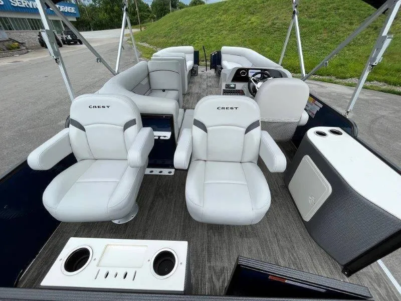 Slide: The Image of 2023 Crest Classic Fish 220 SF pontoon boat interior with plush seating and modern design. - 34