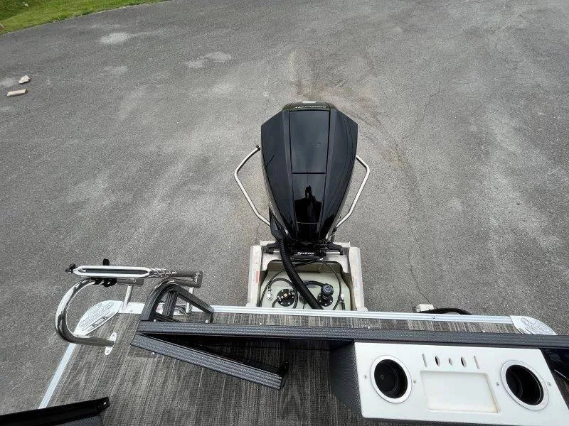 Slide: The Image of 2023 Crest Classic Fish 220 SF boat with outboard motor, viewed from above. - 42