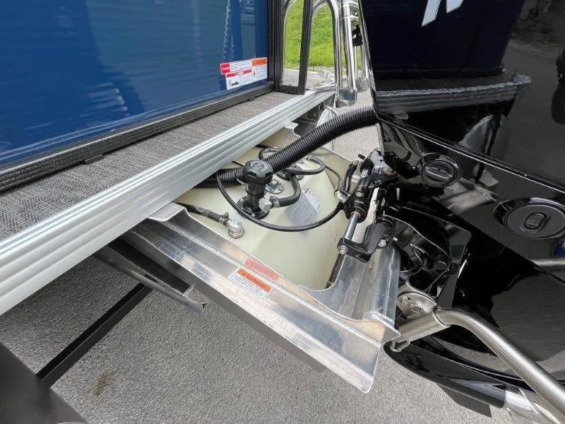 Slide: The Image of Close-up of 2023 Crest Classic Fish 220 SF boat engine compartment. - 7