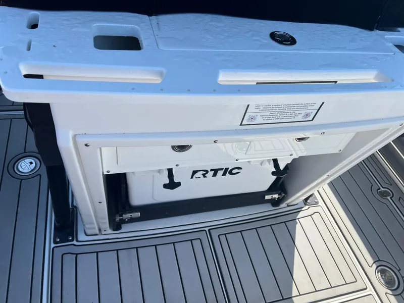 Slide: The Image of 2020 Blackfin 272 CC boat deck with RTIC cooler storage. - 13