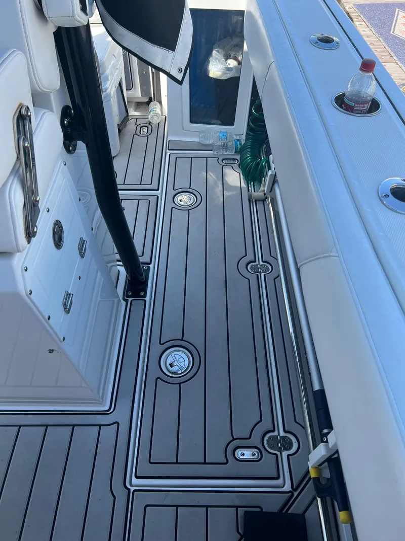 Slide: The Image of 2020 Blackfin 272 CC boat interior with sleek deck design and modern features. - 25