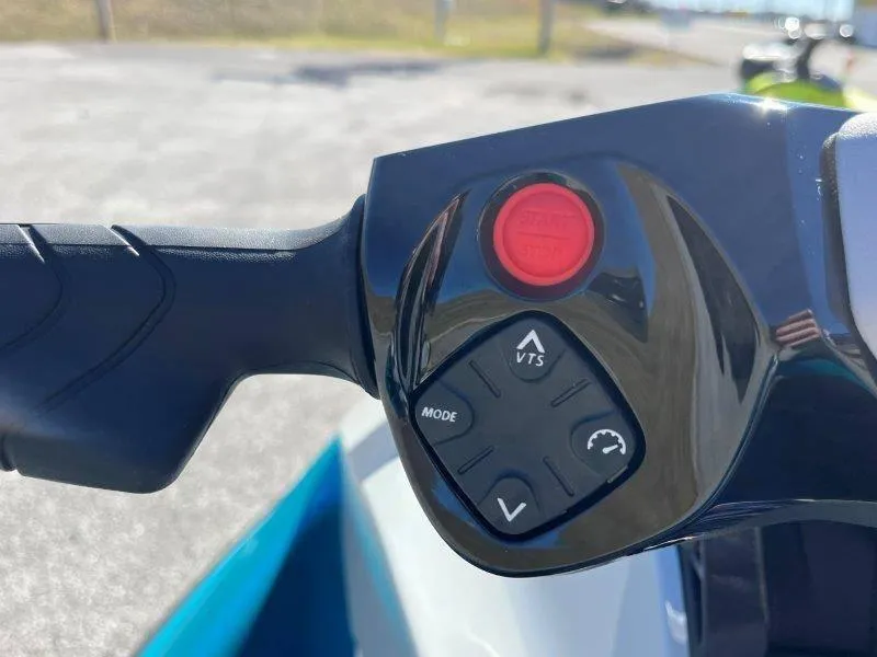 Slide: The Image of Close-up of 2024 Sea-Doo GTI SE 130 IBR handlebar controls. - 16