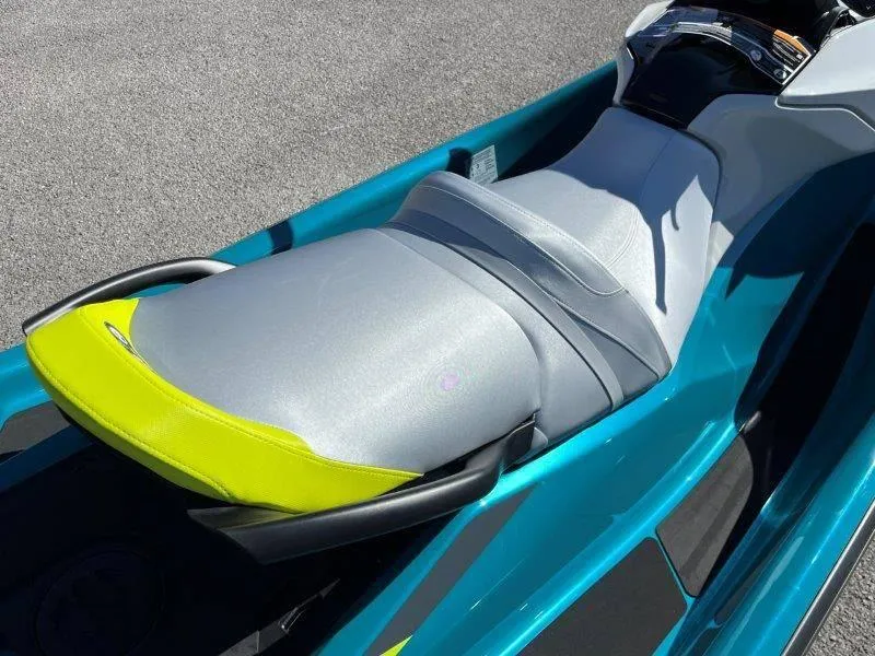 Slide: The Image of 2024 Sea-Doo GTI SE 130 IBR jet ski seat, teal and gray design. - 18