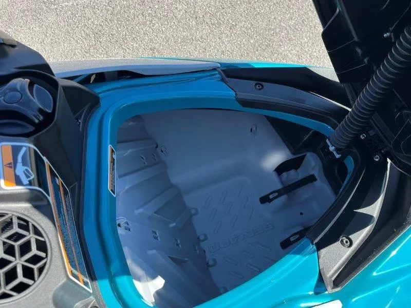 Slide: The Image of 2024 Sea-Doo GTI SE 130 IBR storage compartment, open and empty. - 34