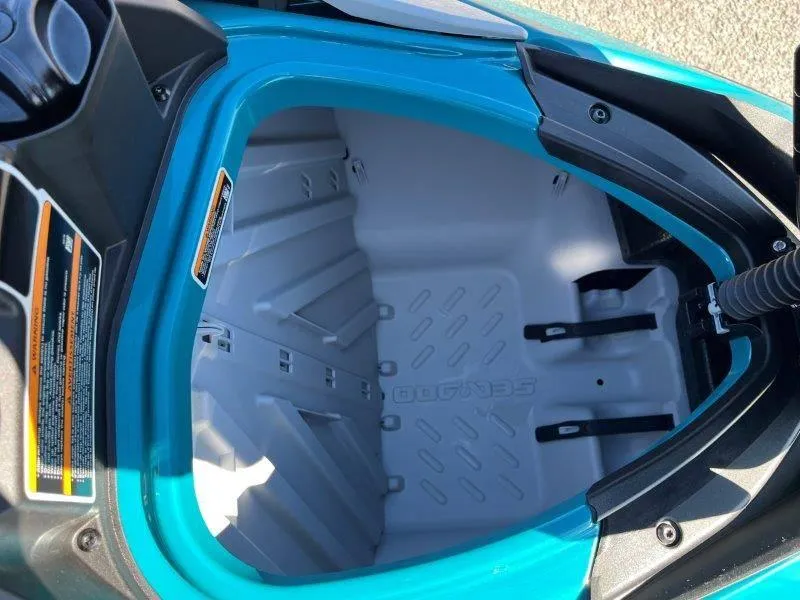 Slide: The Image of 2024 Sea-Doo GTI SE 130 IBR storage compartment, open and empty. - 38