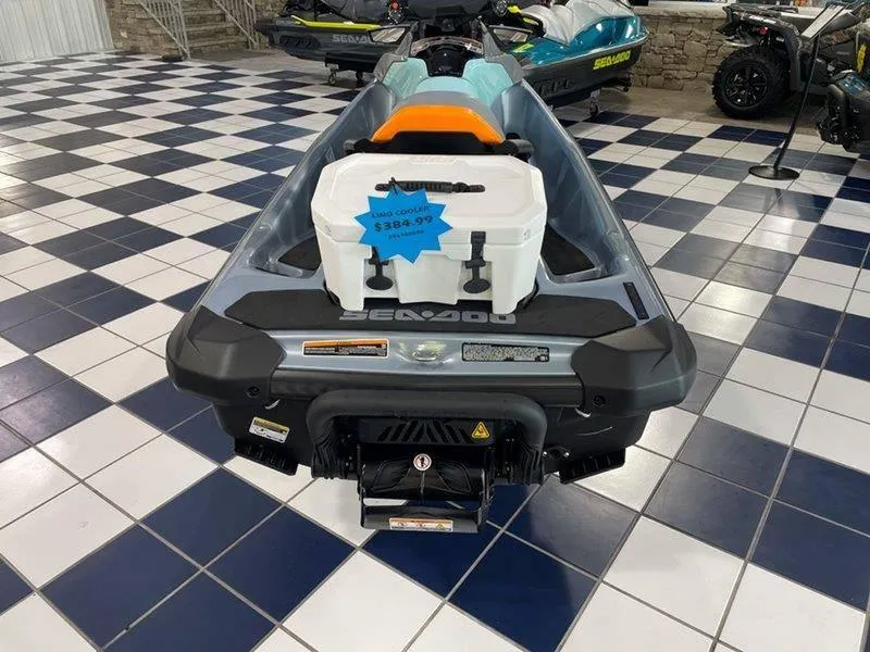 Slide: The Image of 2024 Sea-Doo GTI SE 130 IBR with cooler, displayed on checkered floor. - 8