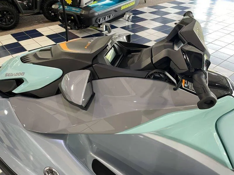 Slide: The Image of 2024 Sea-Doo GTI SE 130 IBR jet ski in showroom, top view. - 9
