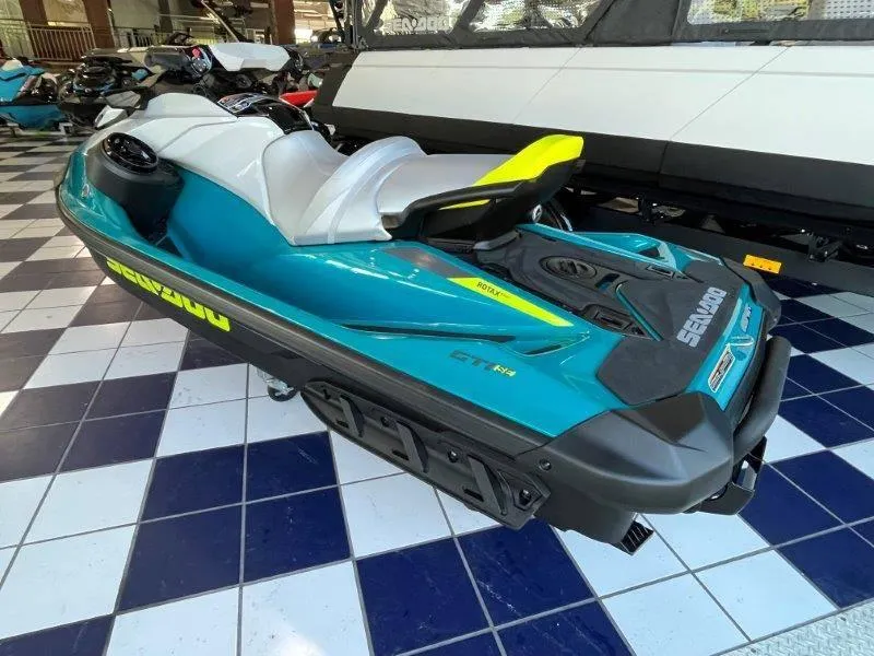 Slide: The Image of 2024 Sea-Doo GTI SE 130 iBR jet ski with audio, iDF, and iBR technology. - 3