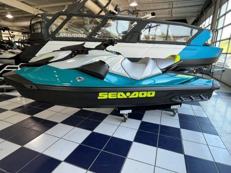 Slide: The Image of 2024 Sea-Doo GTI SE 130 iBR Tech with audio, displayed in showroom. - 4