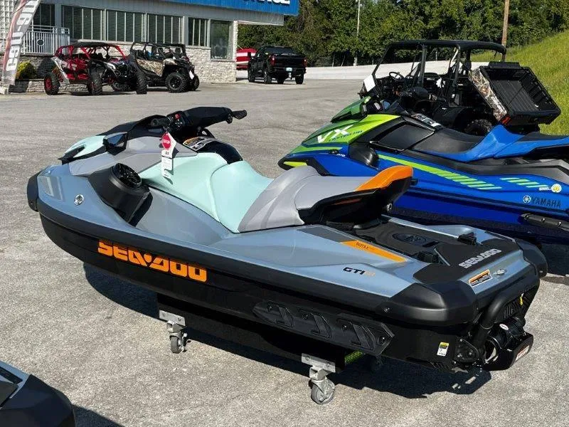 Slide: The Image of 2024 Sea-Doo GTI SE 130 iBR jet ski with audio, displayed outdoors. - 15