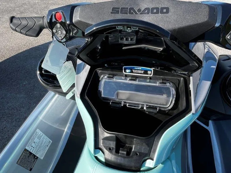 Slide: The Image of 2024 Sea-Doo GTI SE 130 iBR dashboard with storage compartment open. - 32