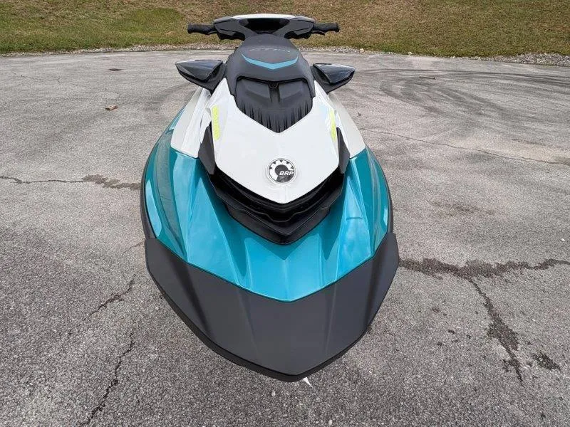 Slide: The Image of 2024 Sea-Doo GTI SE 170 IBR jet ski, front view on pavement. - 17