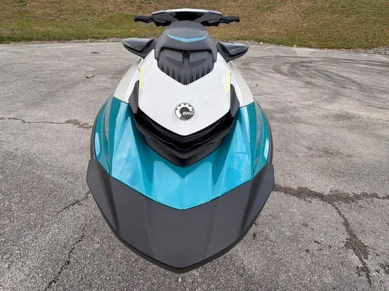 Slide: The Image of 2024 Sea-Doo GTI SE 170 IBR jet ski, front view on pavement. - 19