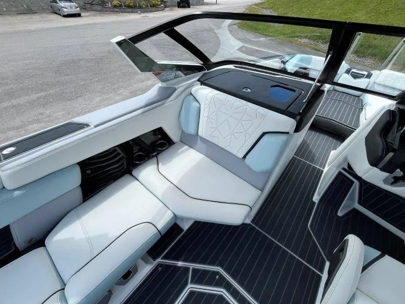 Slide: The Image of Interior of 2020 Nautique Paragon P25 boat with sleek, modern seating and design. - 17