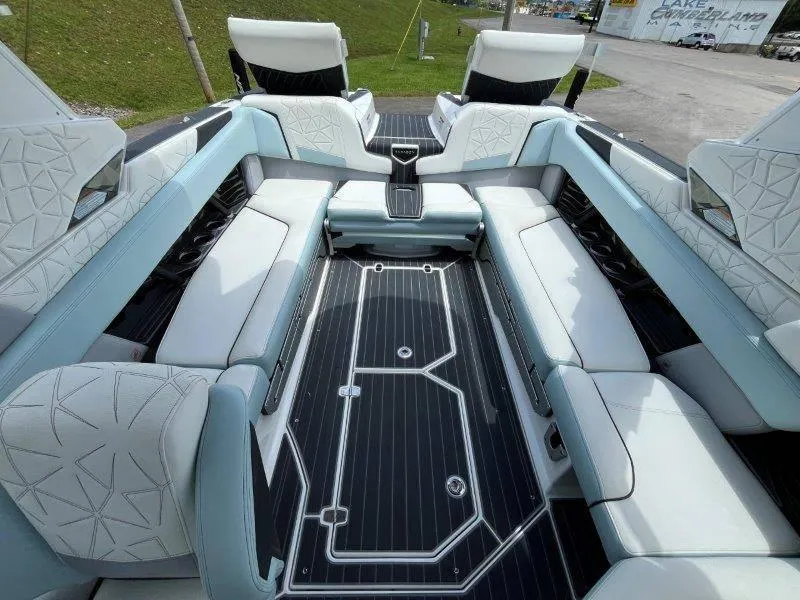 Slide: The Image of 2020 Nautique Paragon P25 interior with luxurious seating and modern design. - 19