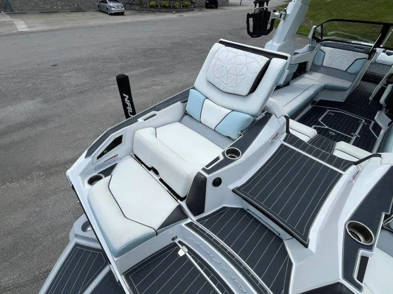 Slide: The Image of 2020 Nautique Paragon P25 boat interior with luxurious seating and modern design. - 20