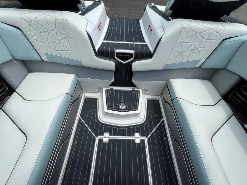 Slide: The Image of 2020 Nautique Paragon P25 interior seating with elegant design and premium materials. - 24