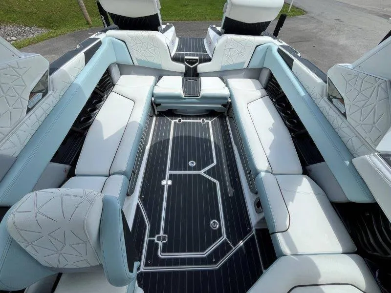 Slide: The Image of 2020 Nautique Paragon P25 interior with luxurious seating and sleek design. - 28