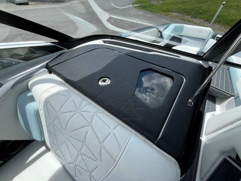 Slide: The Image of 2020 Nautique Paragon P25 interior with sleek design and luxurious seating. - 30