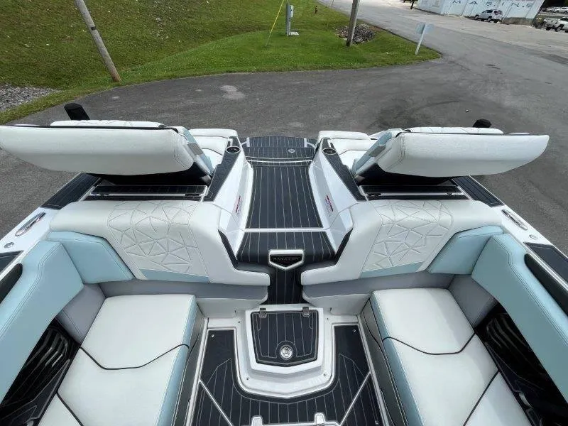 Slide: The Image of 2020 Nautique Paragon P25 boat interior with luxurious seating and sleek design. - 35