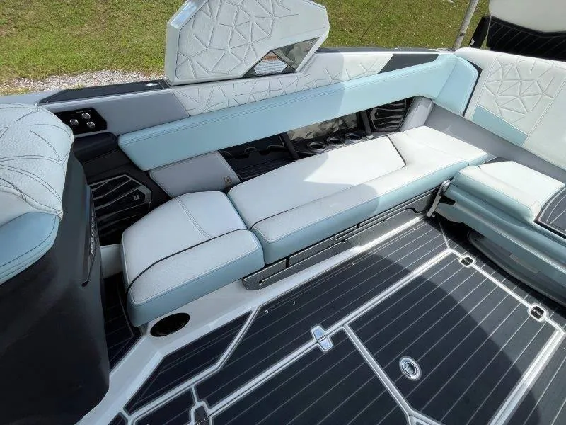 Slide: The Image of 2020 Nautique Paragon P25 interior with luxurious seating and modern design. - 42