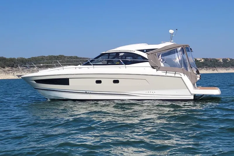 The Image of 2017 Jeanneau LEADER 36 yacht cruising on calm blue waters. - 0