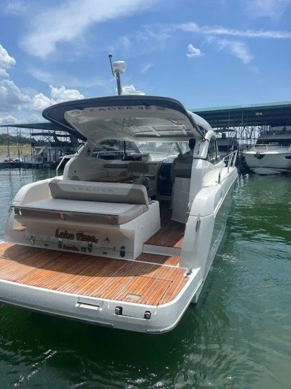 Slide: The Image of 2017 Jeanneau LEADER 36 yacht with covered deck, docked in marina. - 12