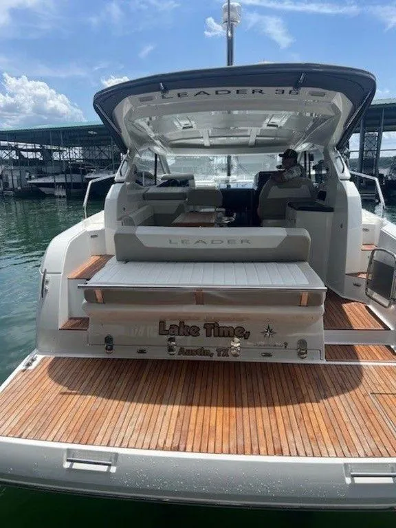 Slide: The Image of 2017 Jeanneau LEADER 36 yacht with covered deck and wooden flooring in marina. - 13
