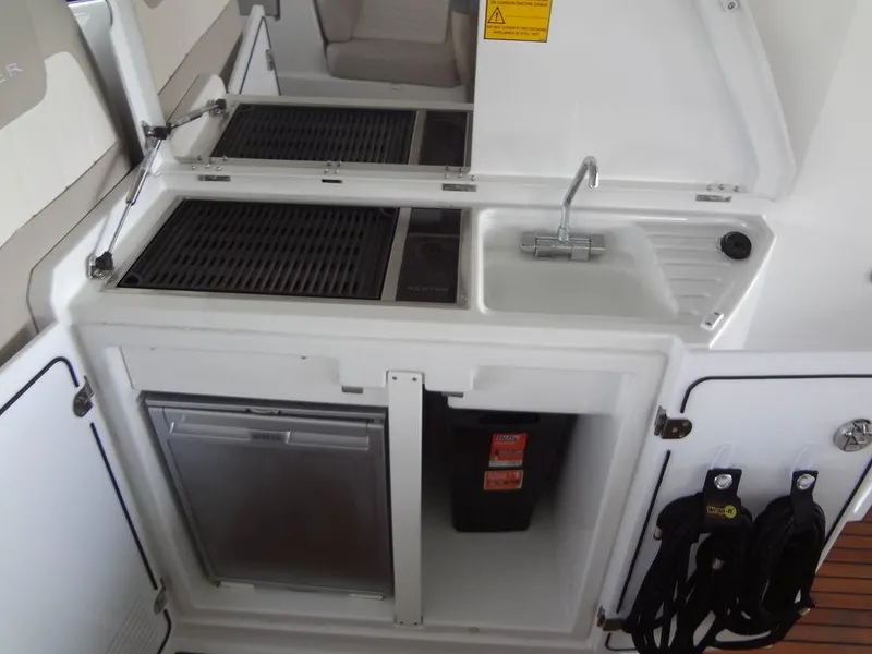 Slide: The Image of Dashboard of 2017 Jeanneau LEADER 36 with gauges and compass. - 25