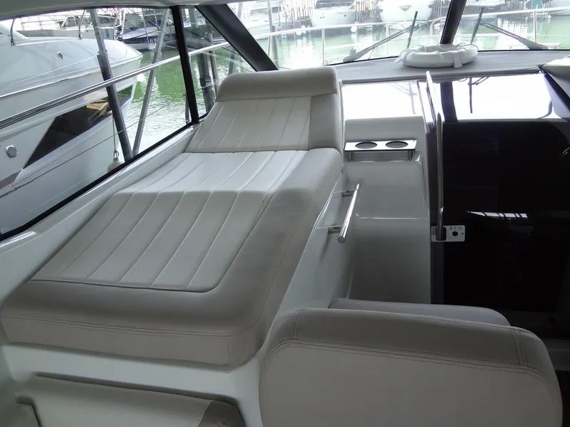 Slide: The Image of 2017 Jeanneau LEADER 36 helm with steering wheel and control panel. - 28