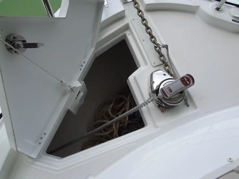 Slide: The Image of 2017 Jeanneau Leader 36 yacht kitchen with stove, sink, and storage cabinets. - 42