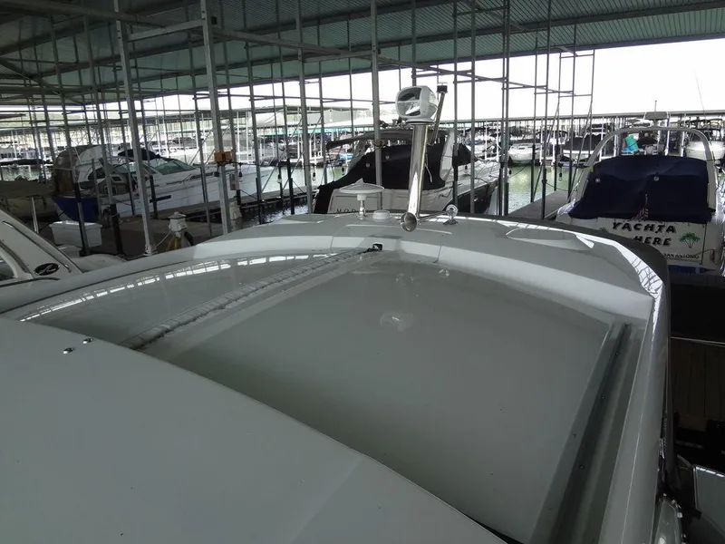 Slide: The Image of Compact kitchen area in a 2017 Jeanneau Leader 36 yacht with open fridge and storage. - 44