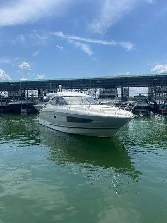 Slide: The Image of 2017 Jeanneau LEADER 36 yacht cruising on a sunny day in clear blue waters. - 5