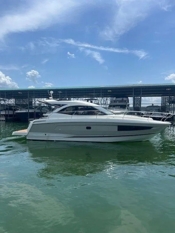 Slide: The Image of 2017 Jeanneau LEADER 36 yacht docked in a covered marina. - 8