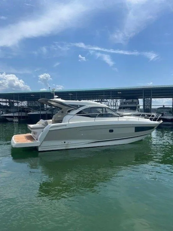 Slide: The Image of 2017 Jeanneau LEADER 36 yacht docked in a marina. - 9