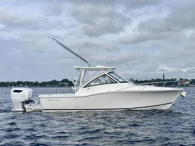 Slide: The Image of 2025 Albemarle 30 Express boat on water, side view, cloudy sky background. - 3