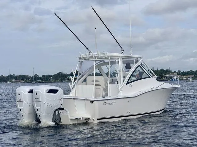 Slide: The Image of 2025 Albemarle 30 Express boat with dual outboard engines on open water. - 4