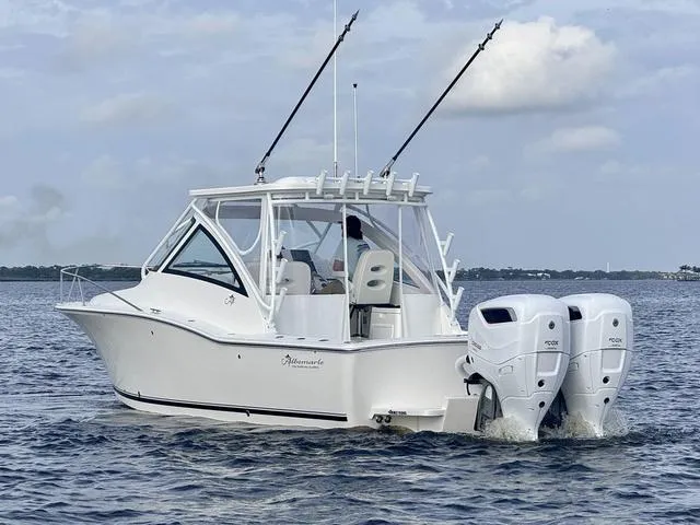 Slide: The Image of 2025 Albemarle 30 Express boat with twin engines cruising on open water. - 6