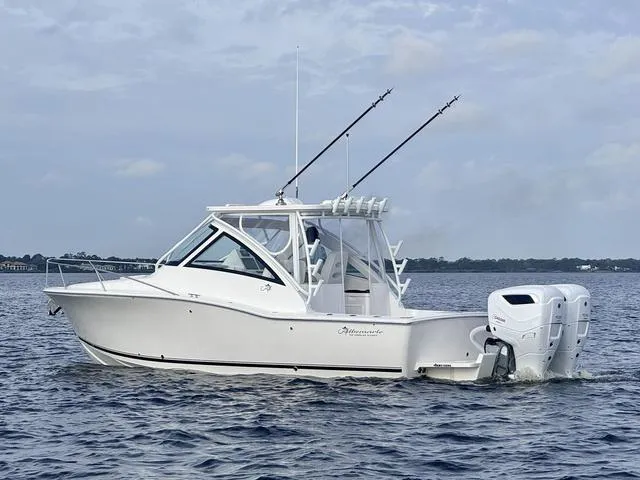 Slide: The Image of 2025 Albemarle 30 Express boat on water with dual outboard engines. - 8
