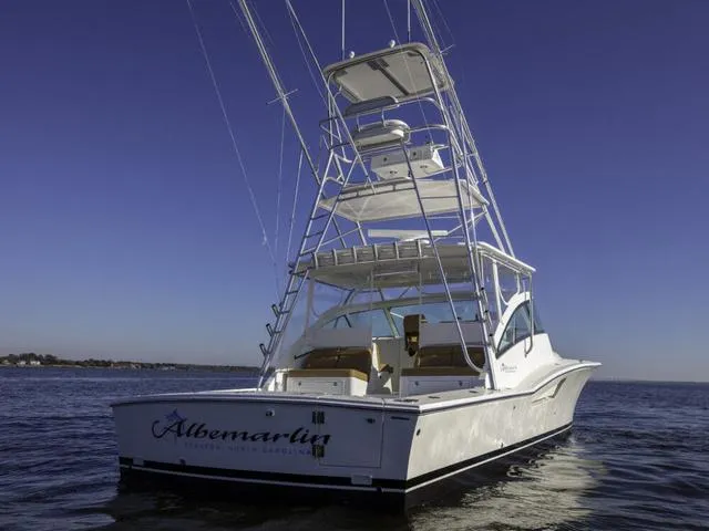 Slide: The Image of 2024 Albemarle 41 Express boat on open water, featuring a tall tower. - 3