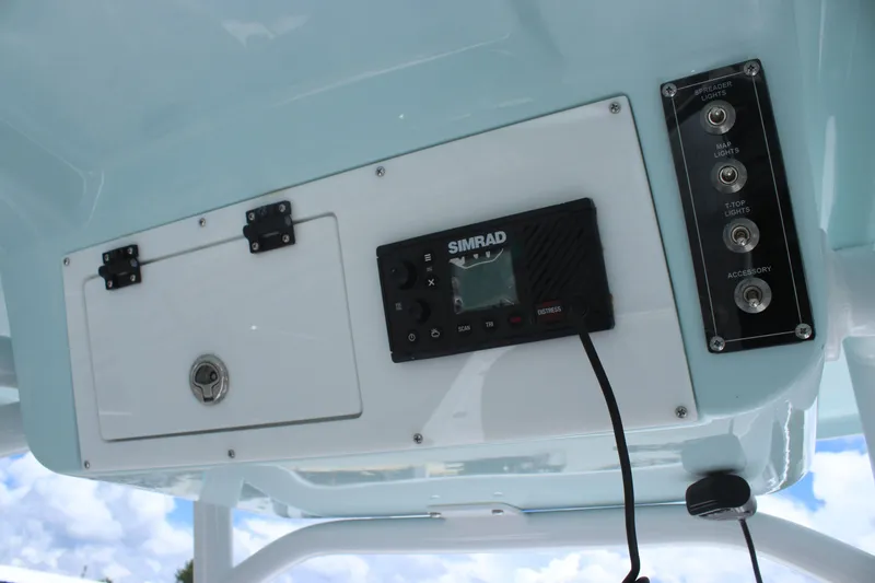 Slide: The Image of 2025 Sea Pro 250 Bay boat console with Simrad electronics and control panel. - 17