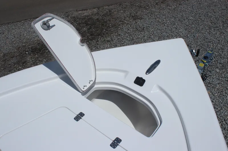 Slide: The Image of 2025 Sea Pro 250 Bay boat with open storage compartment on deck. - 22