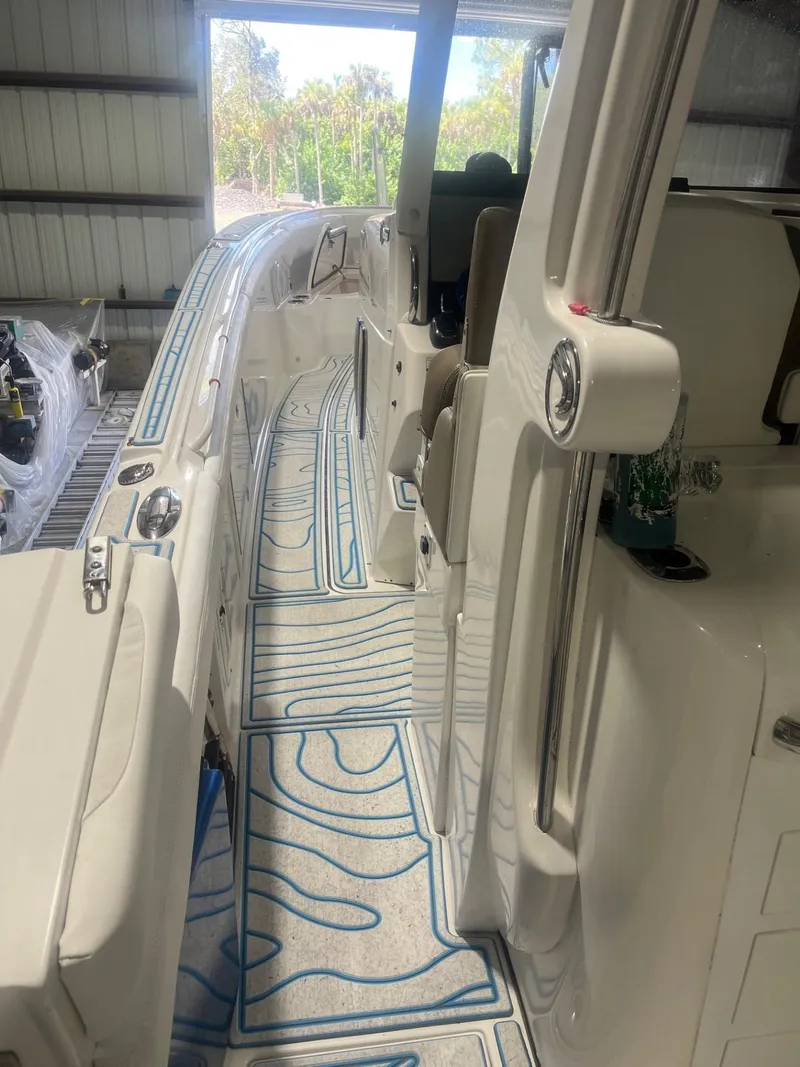 Slide: The Image of 2016 Edgewater 368 CC boat interior with sleek design and modern features. - 14