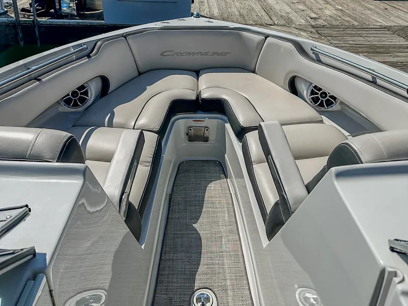 Slide: The Image of 2020 Crownline 255 SS boat interior with plush seating and modern design. - 2