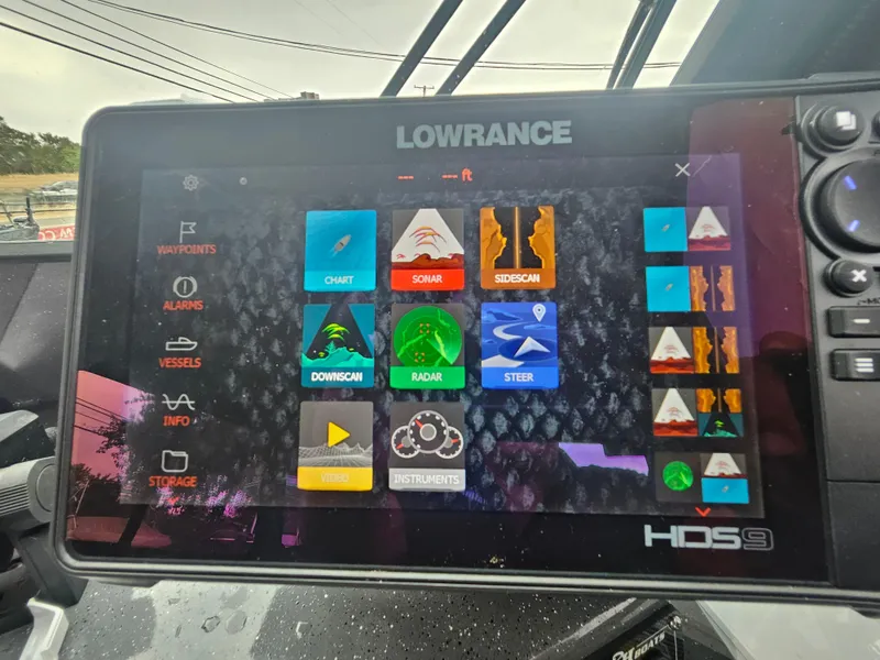 Slide: The Image of Lowrance HDS9 display on 2022 RH Boats 22 Coastal Hard Top, showing navigation and sonar features. - 17