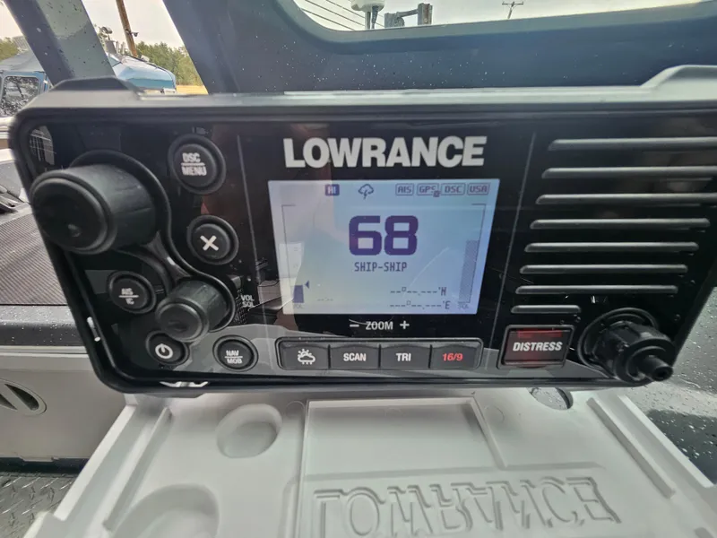 Slide: The Image of Lowrance marine radio on 2022 RH Boats 22 Coastal Hard Top, channel 68 displayed. - 18