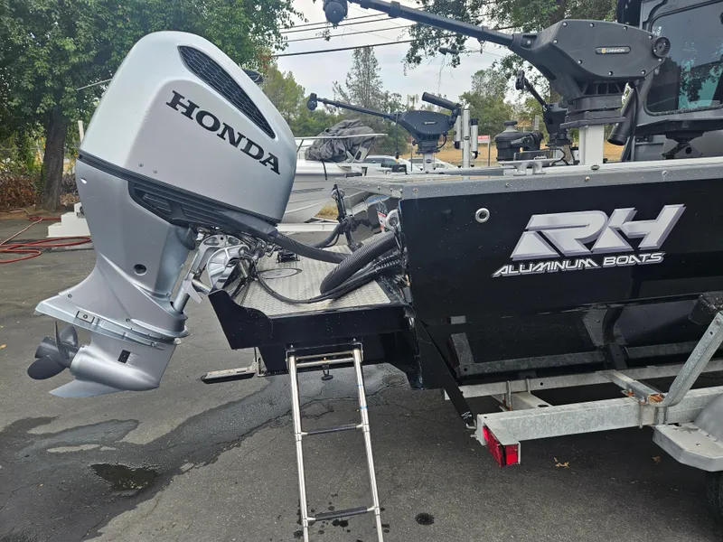 Slide: The Image of 2022 RH Boats 22 Coastal Hard Top with Honda outboard motor. - 5