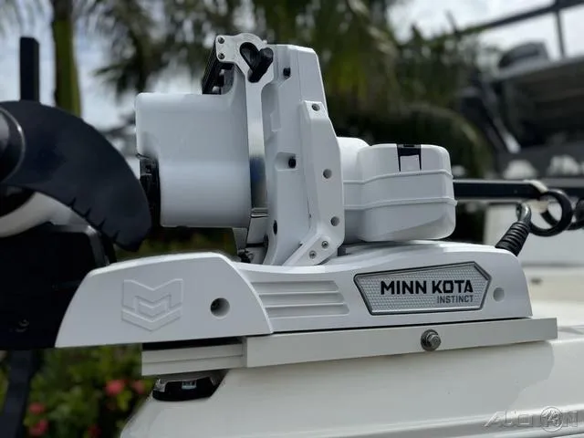 Slide: The Image of Minn Kota Instinct motor on 2025 Skeeter SX230 boat, close-up view. - 4