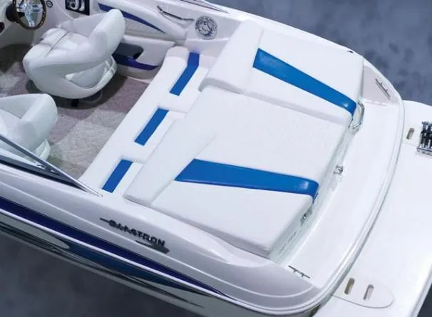 Slide: The Image of 2009 Glastron GT 185 boat interior with white and blue seating. - 18